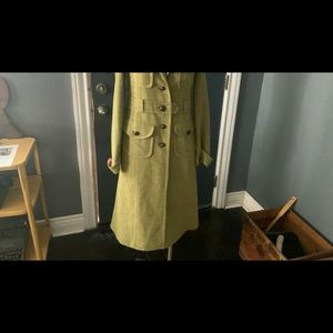 Immaculately detailed S green trench.  Top button missing.